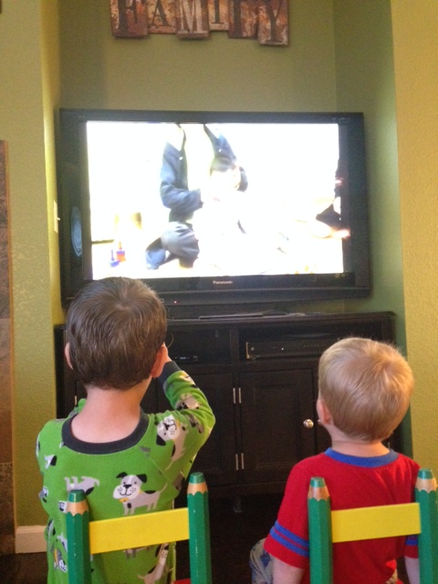 Leighton and Caedmon watching the video of Edric