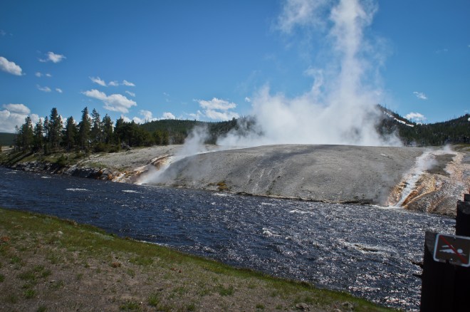Excelsior Geyser spilling into Firehole River