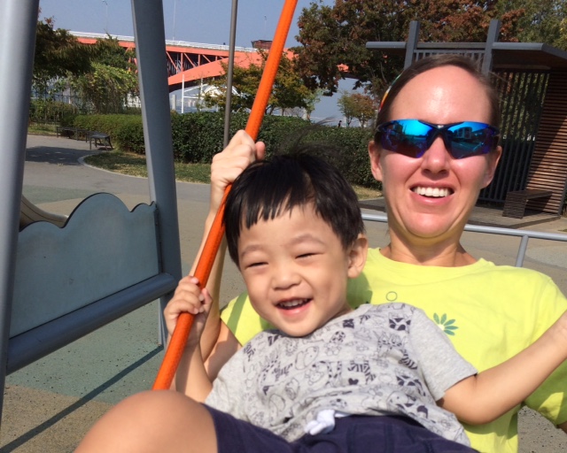 A rare smile on the swings