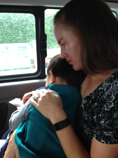 He was crying and pushing against me to get out of the van