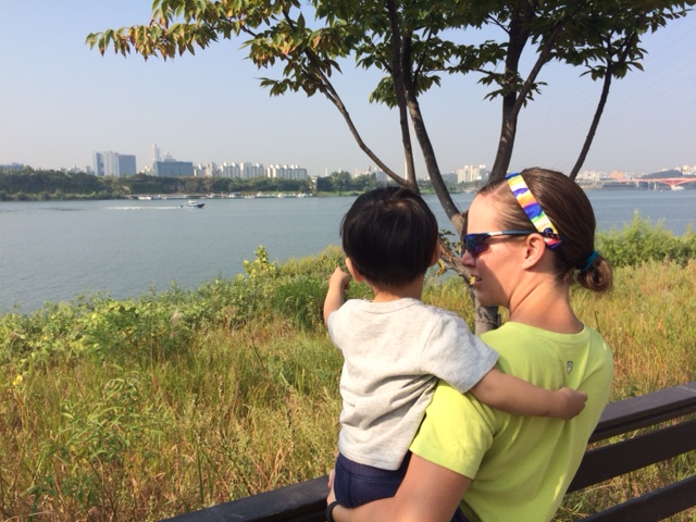 Looking at the boats on the river