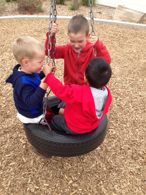 playing on the tire swing