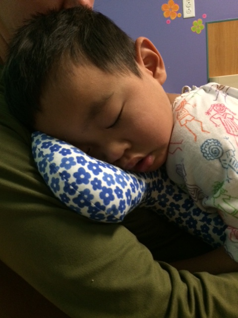 In shut-down mode sleeping on mommy's chest